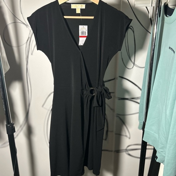 Michael Kors Dresses & Skirts - Michael Kors NWT Black Dress Faux Wrap with Gold Detail On Hip, Size XS